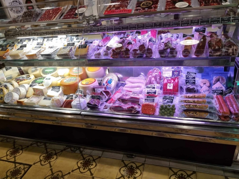 Showcase with assortment of sausages